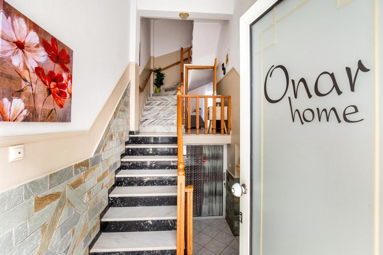 Onarhome Potos Buitenkant foto